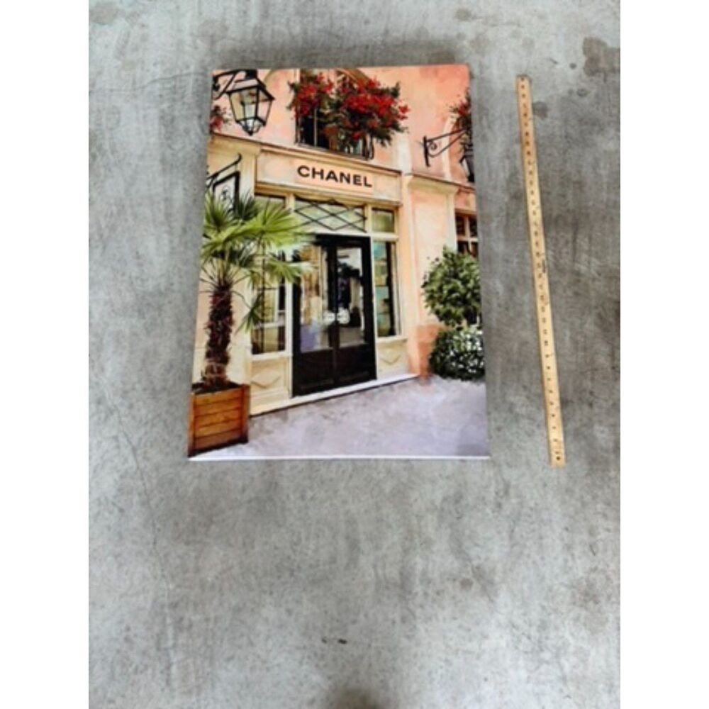 Large 26x36 canvas artwork featuring a designer storefront